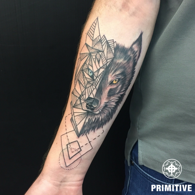 wolf geometric realistic forearm petra primitive tattoo