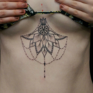 perth primitive tattoo sternum mandala dotwork petra