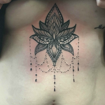 sternum mandala lotus dotwork primitive tattoo
