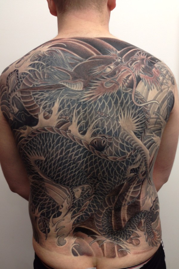 Marc Pinto primitive tattoo Traditional Dragon tattoo