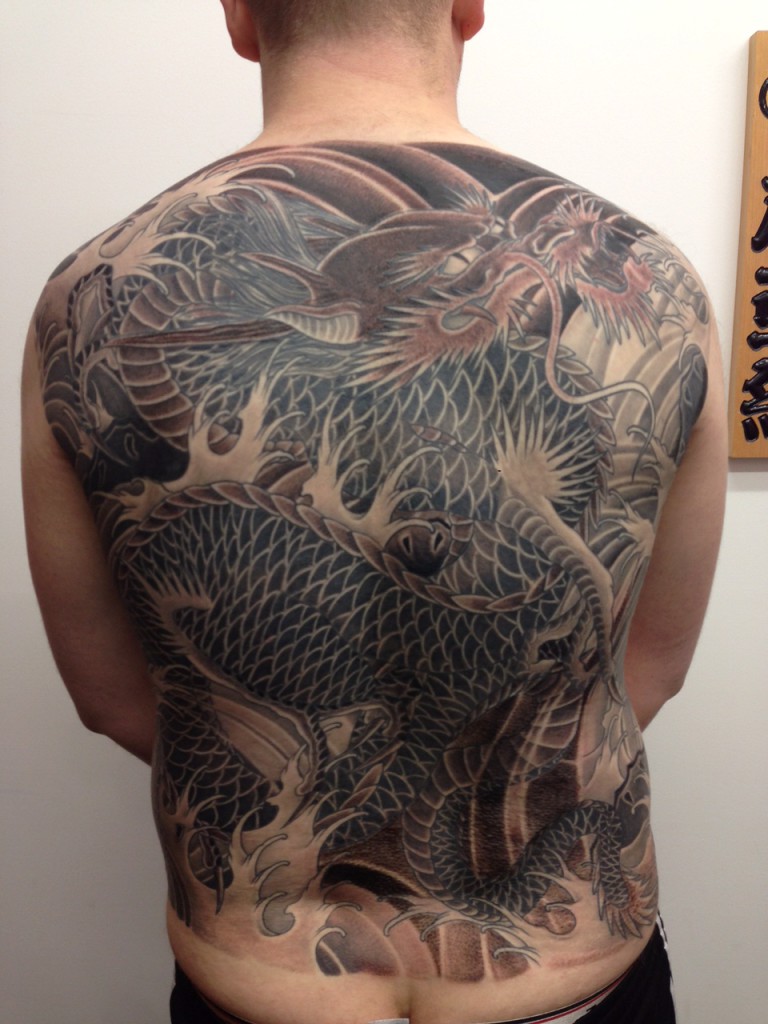 Marc Pinto primitive tattoo Traditional Dragon tattoo