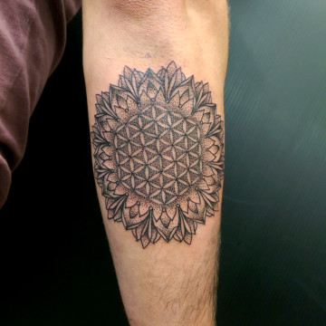 primitive tattoo dotwork flower