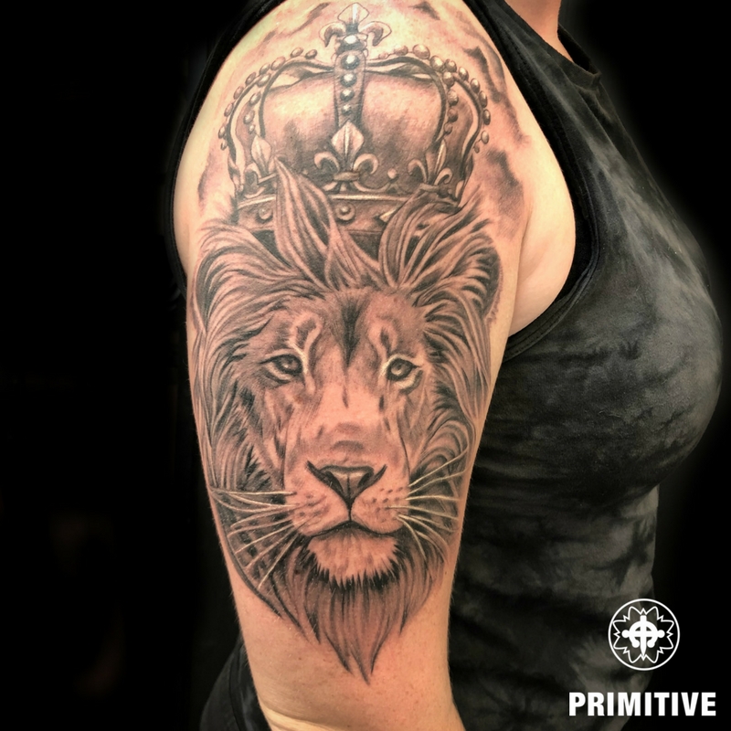 Black and grey realism lion arm tattoo – Primitive Tattoo Perth