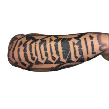 Bold blackletter script forearm tattoo by JC, Primitive Tattoo Perth