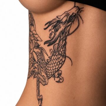 Fine line dragon ribs tattoo – Primitive Tattoo Perth