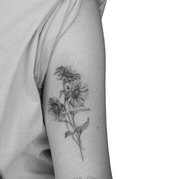 Fine line wildflower upper arm tattoo with script by Nilyu – Primitive Tattoo Perth