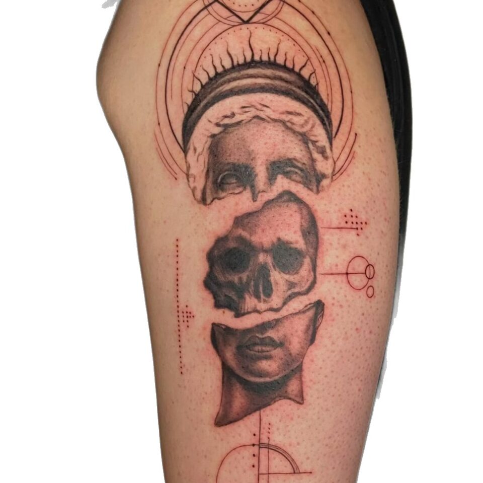 Black and grey skull and geometric upper arm tattoo by Sarah, Primitive Tattoo Perth
