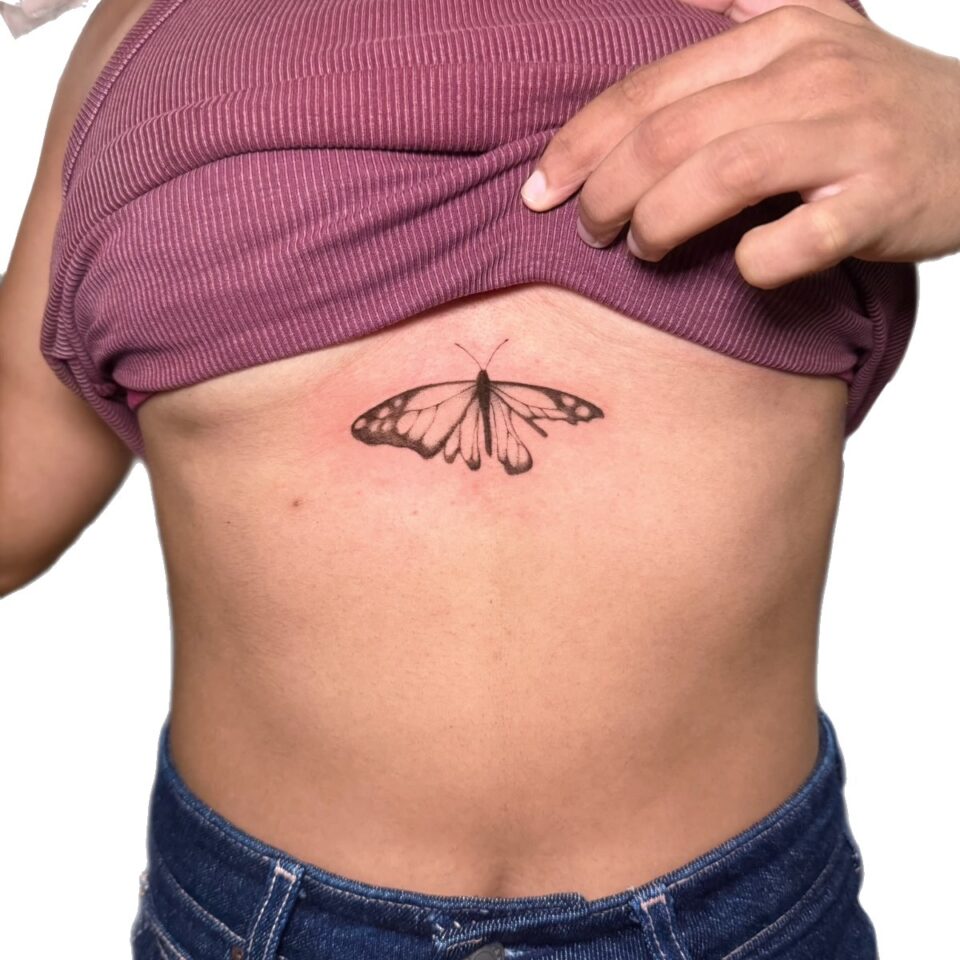 Fine line butterfly sternum tattoo by Sarah, Primitive Tattoo Perth