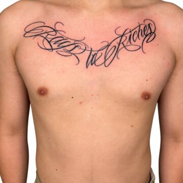 Script lettering chest tattoo – Primitive Tattoo Perth