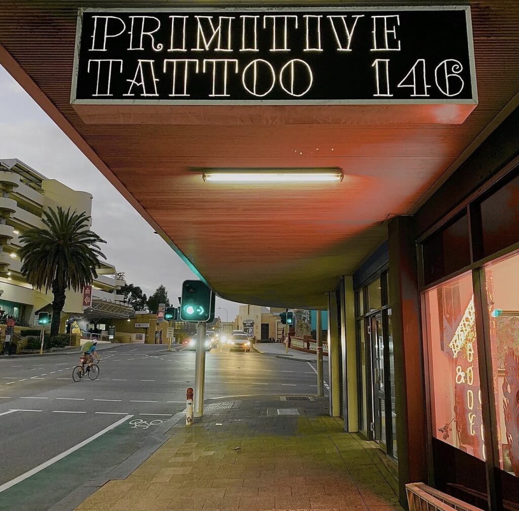 Primitive Tattoo 146 street sign on Barrack Street, Perth CBD WA 6000, a short walk from Elizabeth Quay and the tattoo expo at the Perth Convention and Exhibition Centre