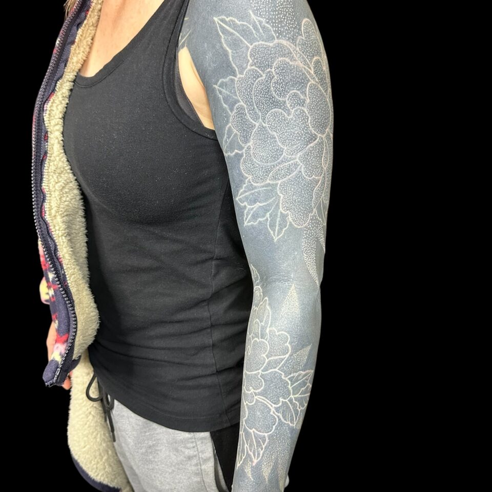 Blackout cover-up sleeve with white peonies – Primitive Tattoo Perth